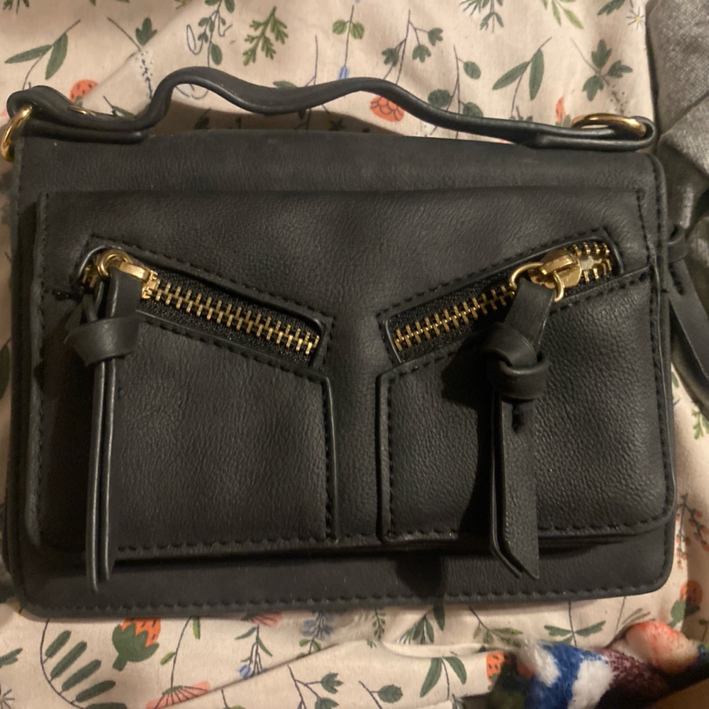 Black crossbody bag with silver accents #crossbodybag